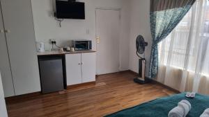 Foto dalla galleria di Epic Den Lodge a Phuthaditjhaba Altre 24 foto