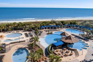 an aerial view of the pool and beach at the resort at North Beach Coastal Breeze in Myrtle Beach