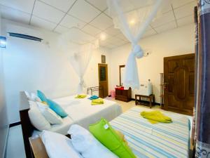 Katil atau katil-katil dalam bilik di The Jungle Path Lodge