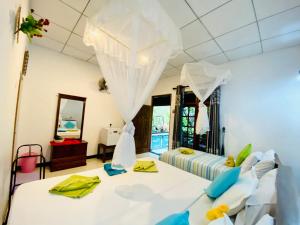 Katil atau katil-katil dalam bilik di The Jungle Path Lodge
