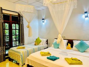 Katil atau katil-katil dalam bilik di The Jungle Path Lodge