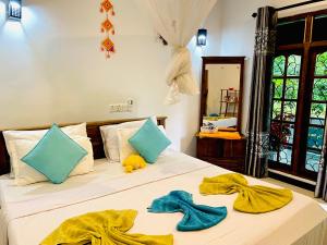 Katil atau katil-katil dalam bilik di The Jungle Path Lodge