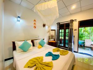 Katil atau katil-katil dalam bilik di The Jungle Path Lodge
