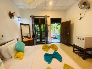 Katil atau katil-katil dalam bilik di The Jungle Path Lodge