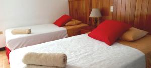 Voodi või voodid majutusasutuse Hotel Sula Sula toas