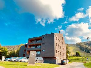 Nespecifikovaný výhled na hory nebo výhled na hory při pohledu z aparthotelu