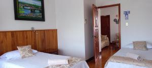 Voodi või voodid majutusasutuse Hotel Sula Sula toas