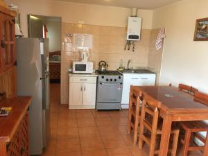 Η κουζίνα ή μικρή κουζίνα στο Cabaña Bahía Loreto - Bahia Inglesa +7 φωτογραφίες