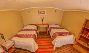 Letto o letti in una camera di Hotel Willcamayu