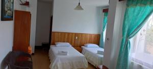 Voodi või voodid majutusasutuse Hotel Sula Sula toas