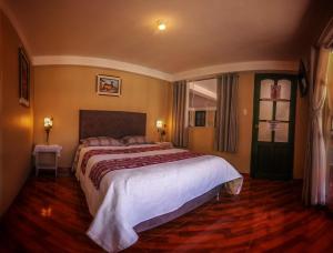 Letto o letti in una camera di Hotel Willcamayu