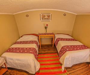 Letto o letti in una camera di Hotel Willcamayu