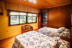 A bed or beds in a room at Villacambote5