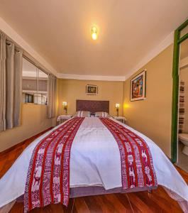 Letto o letti in una camera di Hotel Willcamayu