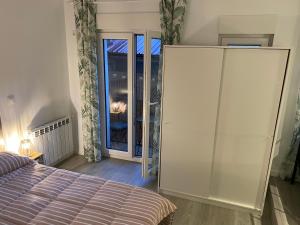Un ou plusieurs lits dans un hébergement de l'établissement Apartamento centro Santander B