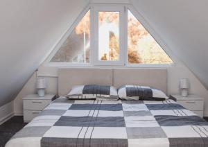 A bed or beds in a room at My sweet home Vrhpraca Jahorina