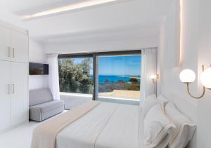 Posteľ alebo postele v izbe v ubytovaní Villa Ouranos - Luxurius modern villa pool, close to the beach