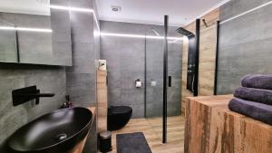 Kúpeľňa v ubytovaní Diamond Luxury Apartment + 13 fotografií