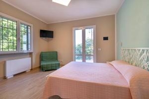 A bed or beds in a room at Agriturismo Cascina Trevo