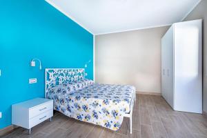 A bed or beds in a room at Agriturismo Cascina Trevo