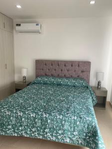 Apartamento 304 en Salinasにあるベッド +5枚の写真