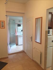 Kuchyň nebo kuchyňský kout v ubytování Apartmán Oáza DC