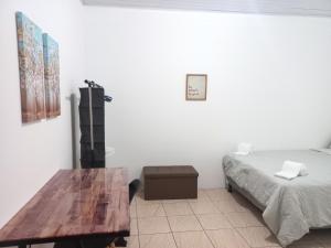 Ένα ή περισσότερα κρεβάτια σε δωμάτιο στο W's Hostel