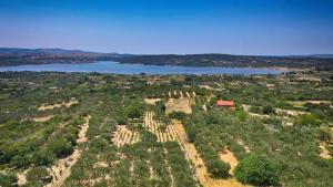 an aerial view of a town and a lake at Villa Serenity in Šibenik +18 photos