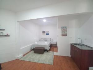 Ένα ή περισσότερα κρεβάτια σε δωμάτιο στο W's Hostel