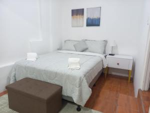 Ένα ή περισσότερα κρεβάτια σε δωμάτιο στο W's Hostel
