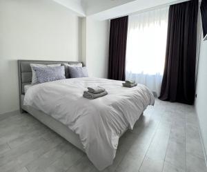 Кровать или кровати в номере OASIS, Charming 1BD apartment with living room