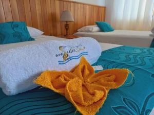 Voodi või voodid majutusasutuse Hotel Sula Sula toas