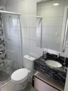 Ένα μπάνιο στο Loft 2 pessoas Ametista centro