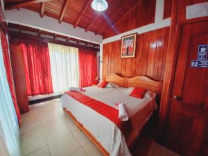 Voodi või voodid majutusasutuse Hotel Sula Sula toas