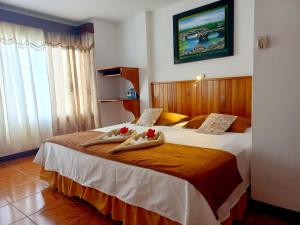 Voodi või voodid majutusasutuse Hotel Sula Sula toas