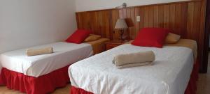 Voodi või voodid majutusasutuse Hotel Sula Sula toas