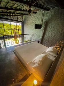 Voodi või voodid majutusasutuse Ecoparadise Hotel toas