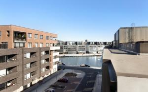 a view of a river in a city with buildings at Azure 30 in Kingston 