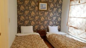 Elf Resort Hotel客房内的一张或多张床位