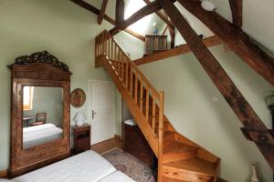 Кровать или кровати в номере Château du Jard
