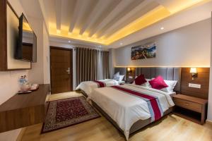 Voodi või voodid majutusasutuse Hotel Ama-La, Thamel, Kathmandu toas