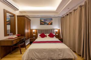 Voodi või voodid majutusasutuse Hotel Ama-La, Thamel, Kathmandu toas