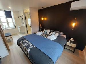 Posteľ alebo postele v izbe v ubytovaní L'incontournable - Loiret Spa