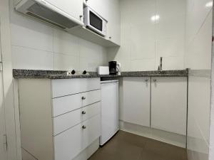 Küche/Küchenzeile in der Unterkunft Apartamentos Venecia
