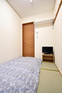 Cama o camas de una habitación en Senju Tamuraya