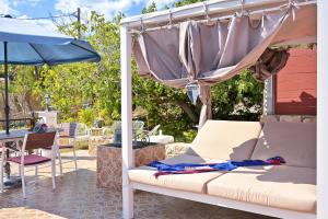 Patio nebo venkovní prostory v ubytování Villa Ireni Waterfont