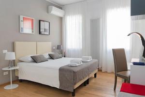 Posteľ alebo postele v izbe v ubytovaní B&B Villa Rosa