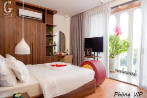 TV a/nebo společenská místnost v ubytování Galaxy Hotel 3