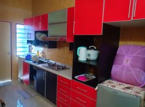 Kuchyň nebo kuchyňský kout v ubytování Zulkifli Homestay Tambun,Ulu kinta,Tg Rambutan