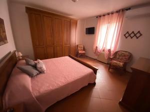 Postel nebo postele na pokoji v ubytování Villa con piscina tra Versilia e Cinque Terre